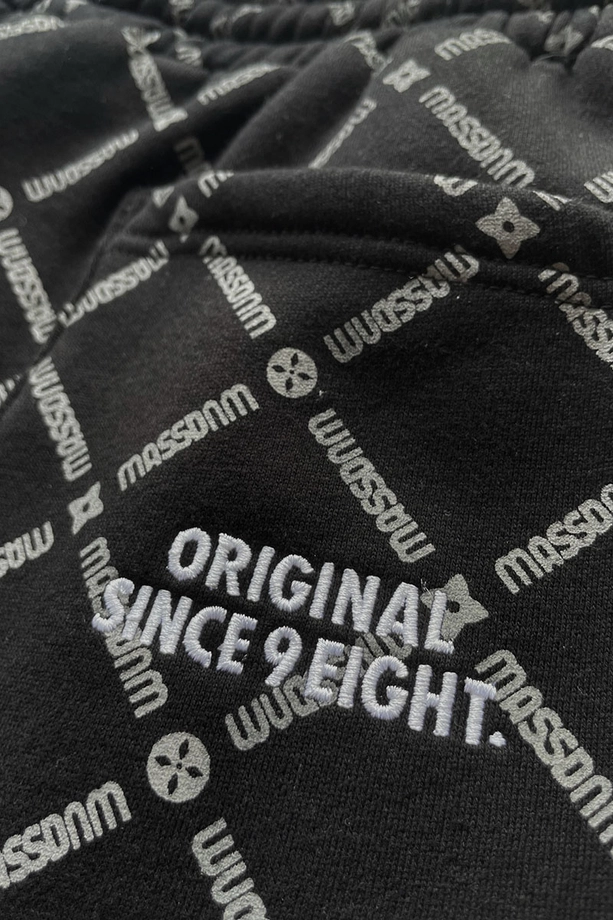 Spodnie dresowe męskie Baggy Mass DNM Monogram czarne