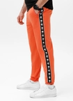 Spodnie męskie dresowe Pitbull Pit Bull Tape Nugget łososiowe pomarańczowe