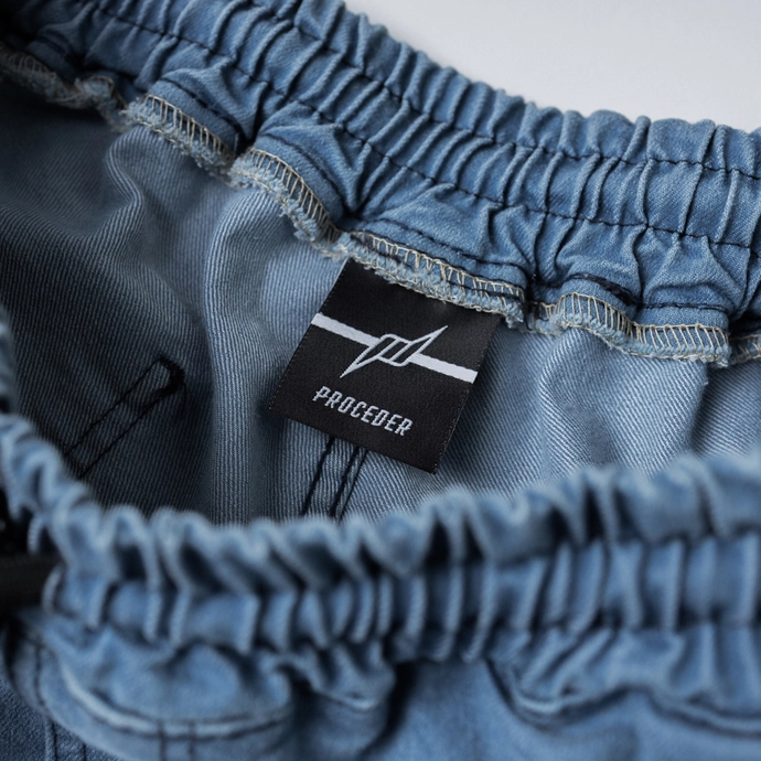 Spodnie męskie jogger jeans Chada Proceder Kastet Logo jasno niebieskie