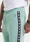 Spodnie męskie dresowe Pitbull Pit Bull Tape Nugget miętowy zielony