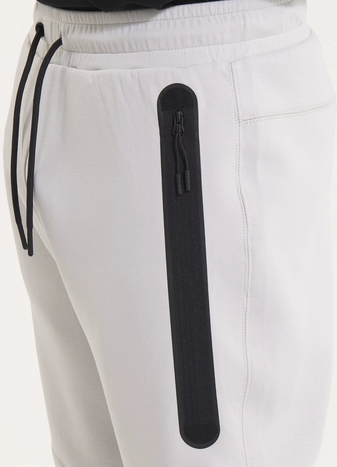 Spodnie męskie dresowe Pitbull Pit Bull Dogwood Pocket złamana biel