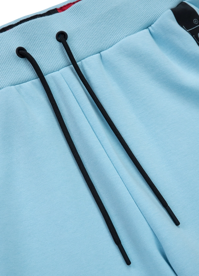 Spodnie dresowe damskie Pitbull Pit Bull Chelsea 24 jasno niebieskie